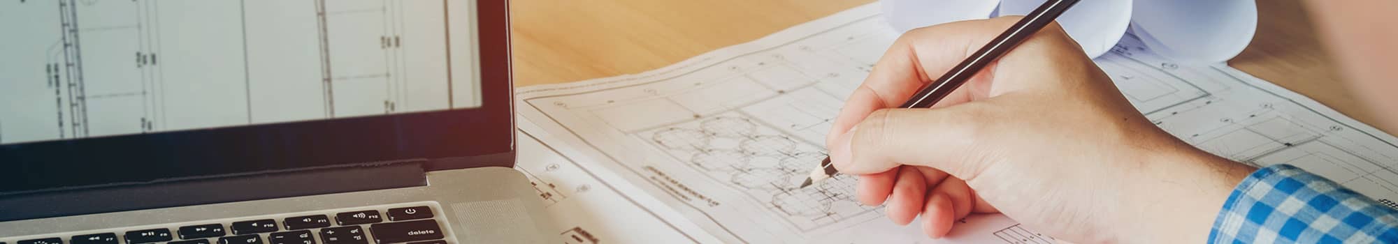 Designer working on pharmacy plans in Shropshire